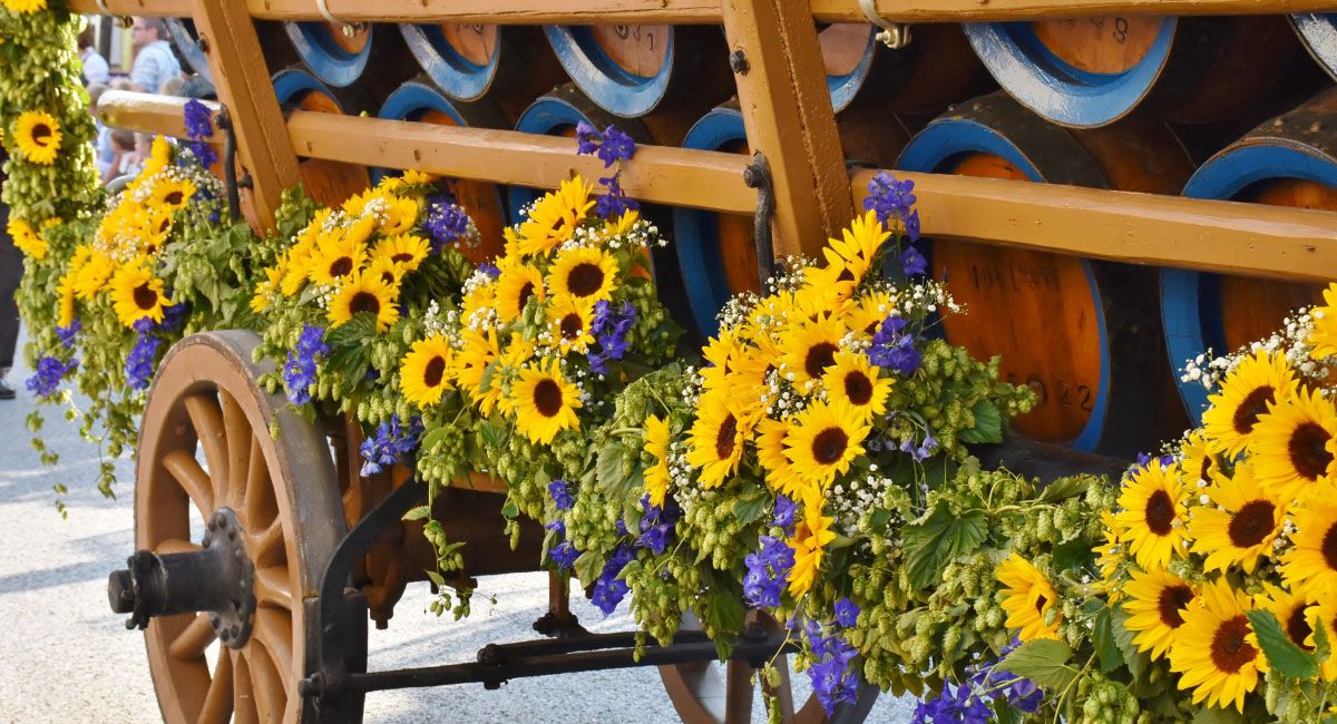 Wagon with Flowers and Wooden Barrels